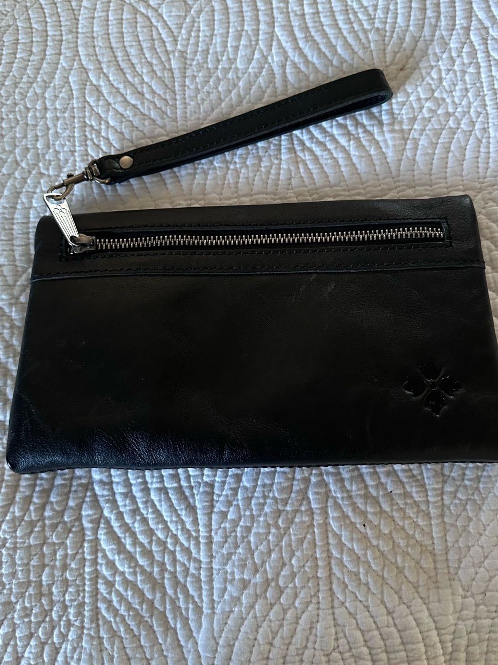 Patricia Nash Black Leather clutches with Embossed Clover Motif